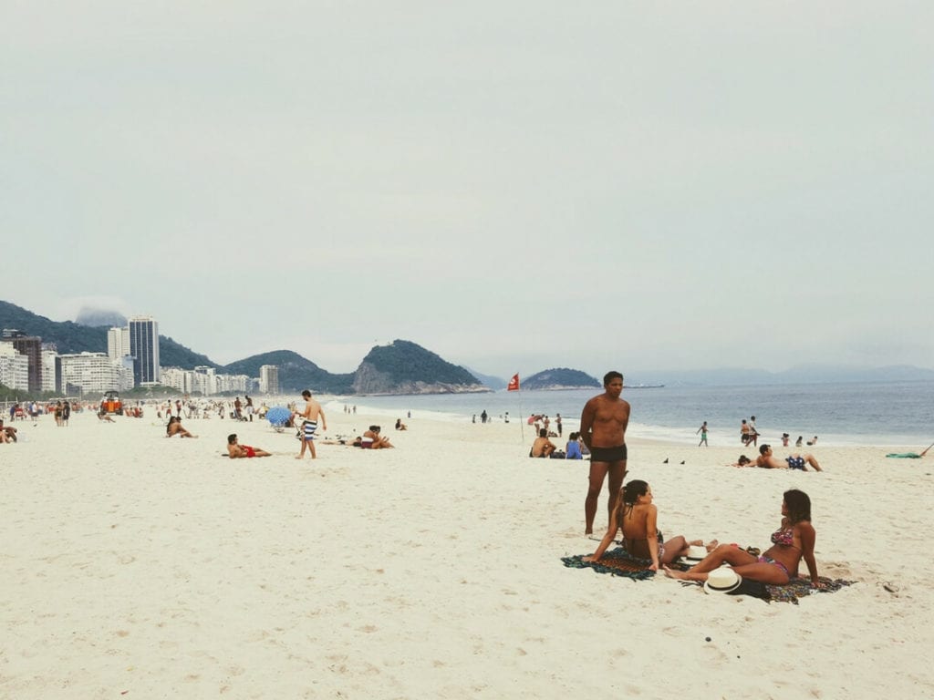 Sunbake on Copacabana with the locals