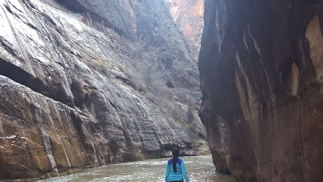 woman-walking-alone-river