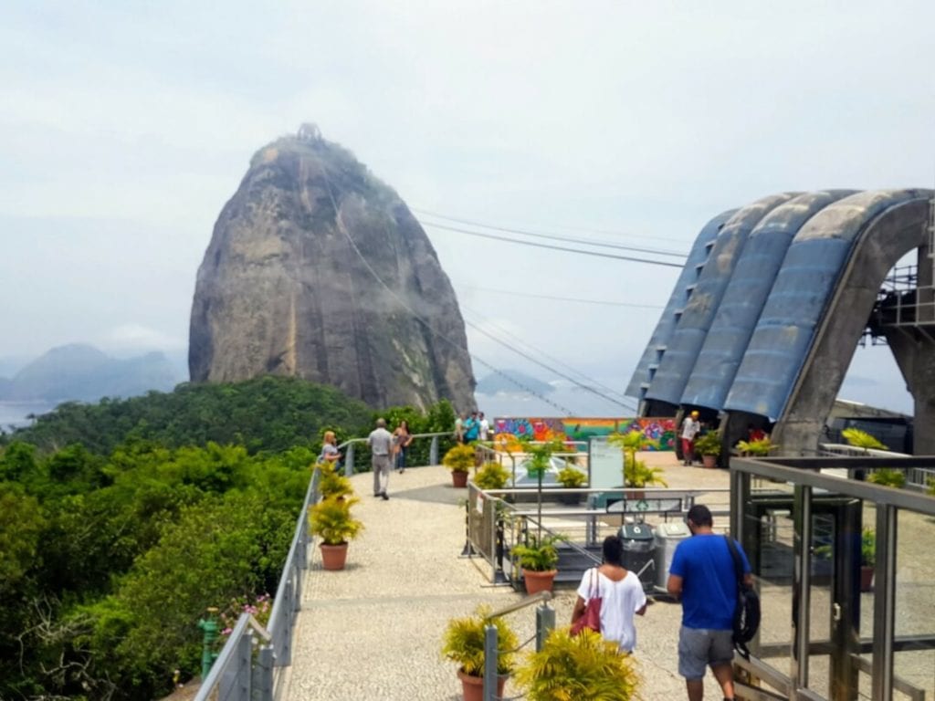 Sugarloaf Mountain pictured on a cloudy day is on of the unique things to do in Rio de Janeiro