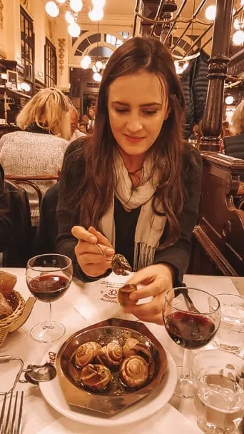 woman-eating-escargo-snails-dinner-chartier-restaurant-paris