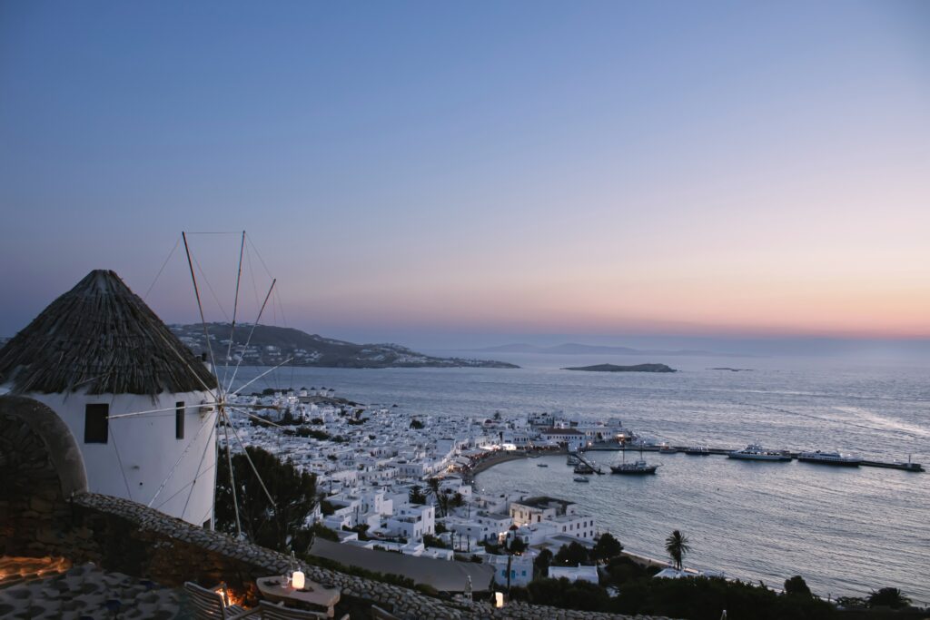mykonos sunset with windmill in foreground
